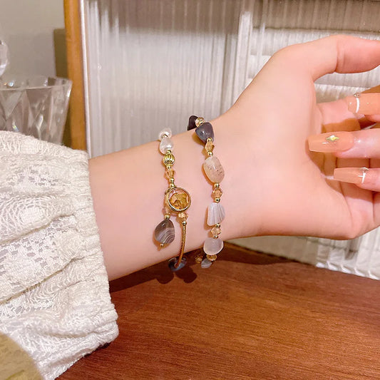 Double layer wear imitation natural stone pearl bracelet female niche design delicate string retro light luxury hand jewelry
