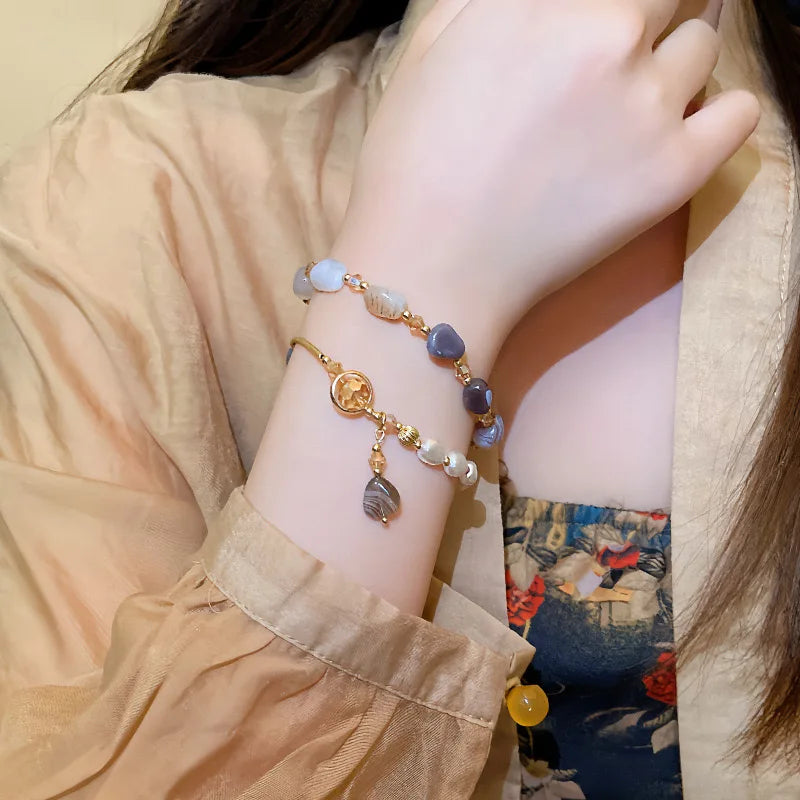 Double layer wear imitation natural stone pearl bracelet female niche design delicate string retro light luxury hand jewelry