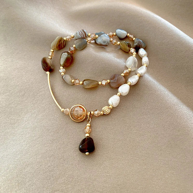 Double layer wear imitation natural stone pearl bracelet female niche design delicate string retro light luxury hand jewelry