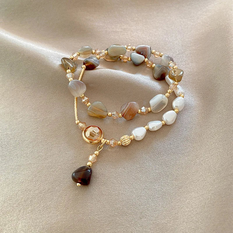 Double layer wear imitation natural stone pearl bracelet female niche design delicate string retro light luxury hand jewelry